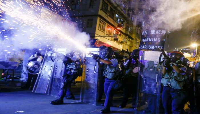 Police fire tear gas at anti-extradition bill protesters during clashes in Sham Shui Po in Hong Kong, August 14, 2019. REUTERS 