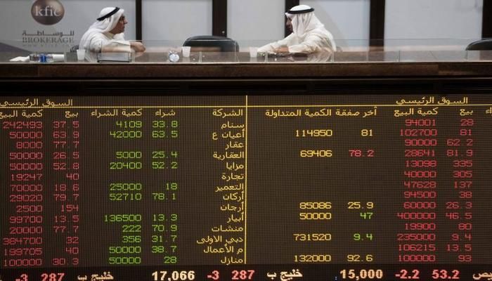 Kuwait traders are seen at the Kuwait Boursa stock market trading hall in Kuwait city, Kuwait September 16, 2019. REUTERS 