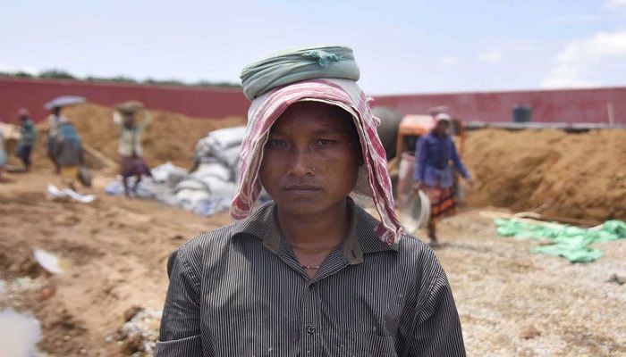 Shefali Hajong, a labourer whose name is excluded from the final list of the National Register of Citizens (NRC), poses for a picture at the site of an under-construction detention centre for illegal immigrants at a village in Goalpara district in the northeastern state of Assam, India, September 1, 2019 Reuters