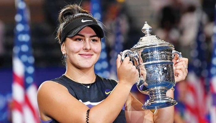 Bianca Andreescu of Canada celebrates with the trophy after defeating Serena Williams of the USA in their 2019 US Open women’s singles final in New York on Saturday. — Reuters photo 