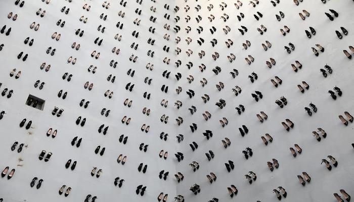 An art installation by Turkish artist Vahit Tuna shows 440 pairs of high heels, the number of women murdered by men in Turkey in 2018, symbolizing the victims of domestic violence, in Istanbul, Turkey. Picture taken September 11, 2019. REUTERS