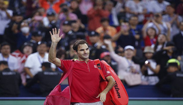 Roger Federer of Switzerland waves to spectators as he leaves the court after he lost to Alexander Zverev of Germany in their men's singles quarterfinals match at the Shanghai Masters tennis tournament at Qizhong Forest Sports City Tennis Center in Shanghai, China, Friday, Oct. 11, 2019. Photo: AP