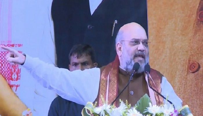 Union Home Minister Amit Shah addressing a seminar on NRC at the Netaji Indoor Stadium in Kolkata. Photo: Collected from Twitter