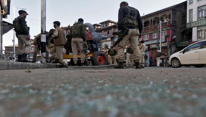Indian police officers stand at the site of a grenade attack in Srinagar October 12, 2019. REUTERS