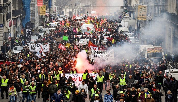 People march in Marseille, France, during a demonstration as part of a countrywide day of protests over a government pensions overhaul. Photo: CHRISTOPHE SIMON/AFP