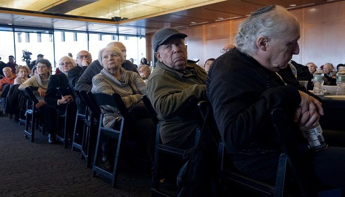 Survivors of the Holocaust and others listen to remarks as they gather at the Museum of Jewish Heritage in New York Sunday, Dec. 22, 2019, to recognize International Holocaust Survivors Night, one of several events held around the world. The event was held in conjunction with the Conference on Jewish Material Claims Against Germany (Claims Conference), developed to aid Jewish victims of Nazism. Photo: AP