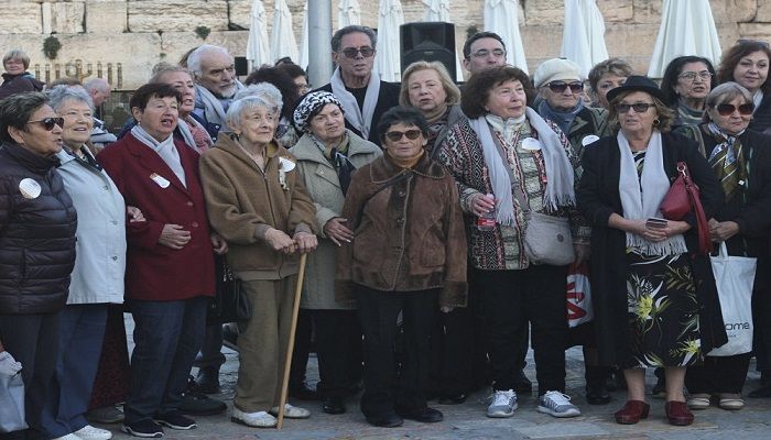 Holocaust survivors pose for a group photo during a ceremony at the Western Wall, the holiest site where Jews can pray, in Jerusalem's Old City, Monday, Dec. 23, 2019. Holocaust survivors in several cities around the world are lighting candles for Hanukkah together, as Jewish community leaders try to keep first-hand memories of the Nazi horrors alive. Photo: AP