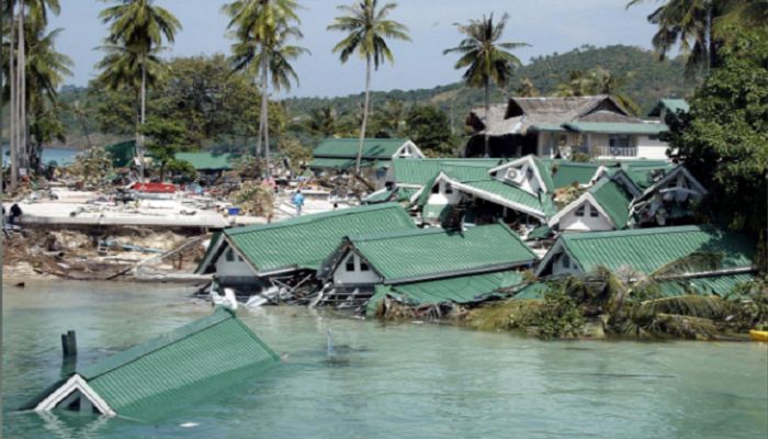 
FILE PHOTO: Submerged buildings are seen near the pier at Ton Sai Bay in Thailand's Phi Phi island, December 28, 2004 after a tsunami hit the area. REUTERS/Luis Enrique Ascui/File Photo