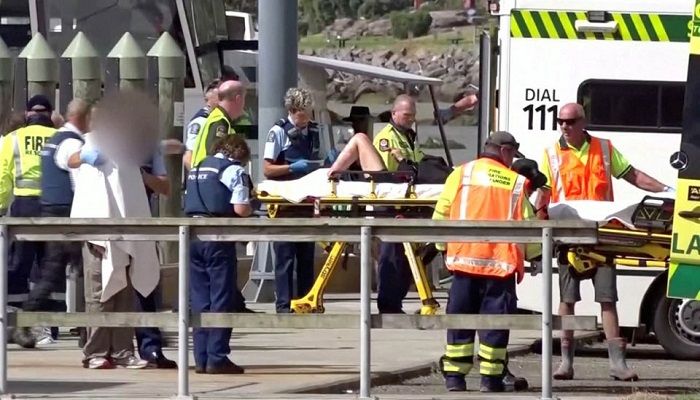 A person injured by the White Island volcano eruption is wheeled into a waiting ambulance on a stretcher in Whakatane, New Zealand, December 9, 2019, in this still image taken from video. Photo: Reuters