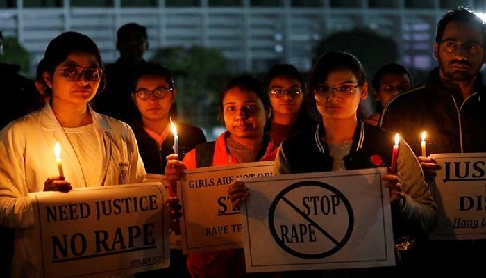 Resident doctors and medical students from All India Institute Of Medical Sciences (AIIMS) attend a candle-lit march to protest against the alleged rape and murder of a 27-year-old woman on the outskirts of Hyderabad, in New Delhi, India, December 3, 2019. REUTERS
