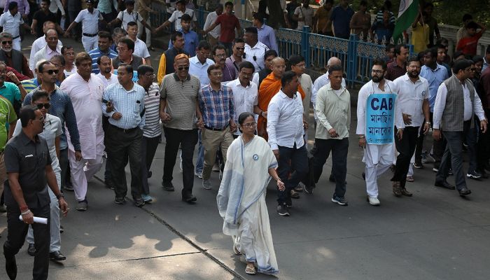Mamata Banerjee, the Chief Minister of West Bengal, and her party supporters attend a protest march against the National Register of Citizens (NRC) and a new citizenship law, in Kolkata, India, December 16, 2019. Photo: Reuters