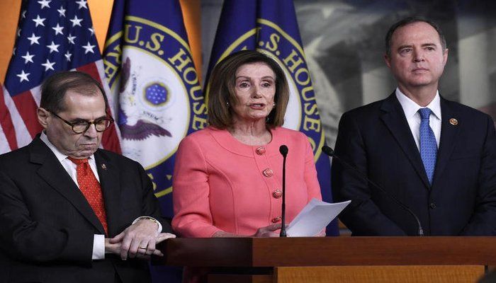 House Speaker Nancy Pelosi of California (center), flanked by House Judiciary Committee Chairman Rep. Jerrold Nadler, D-New York (left), and House Intelligence Committee Chairman Rep. Adam Schiff, D-California, speaks Wednesday during a news conference to announce impeachment managers on Capitol Hill in Washington. Photo: Collected from AP
