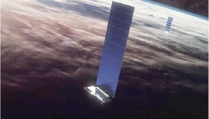 Artwork: The 250kg satellites have a "flatpack" design which unfolds a solar array in orbit. Photo: SpaceX