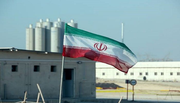 A picture taken on November 10, 2019, shows an Iranian flag at Iran's Bushehr nuclear power plant. Photo: AFP.