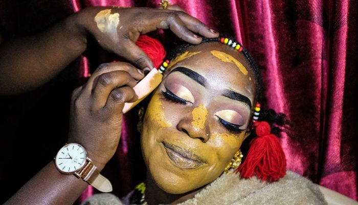 A bride from the Nubian ethnic group has her make-up done in August before her wedding in Kenya's capital, Nairobi. Photo: BBC