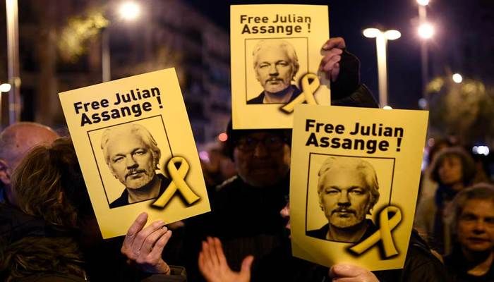 'Julian Assange Stripped Naked And Handcuffed'