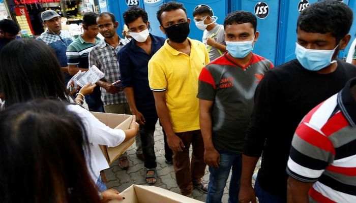 Singapore Reports Record New Cases, Quarantines 20,000 Migrant Workers    