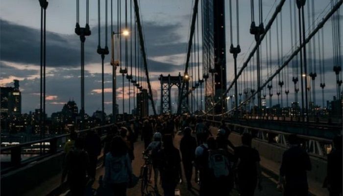 Protesters were defiant on New York's Manhattan Bridge. Photo: Collected