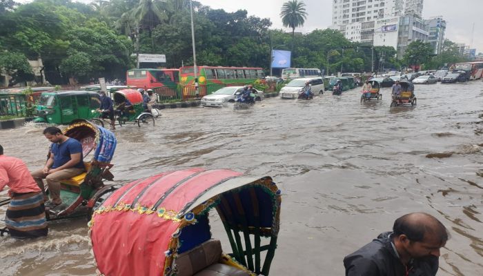 Waterlogging Triggered by Overnight Rains Hampers Dhaka Life  