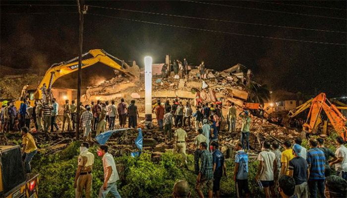 Dozens Feared Trapped in India Building Collapse