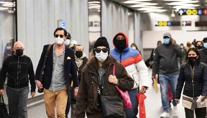 Keep the Mask: A Vaccine Won’t End Pandemic Right Away