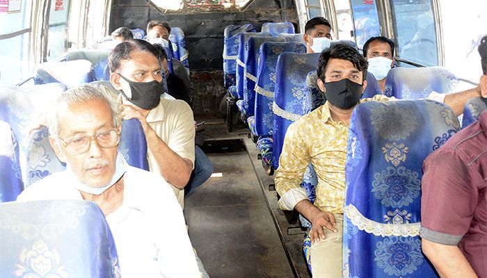 As per the instructions of the government, public transport has started operating in the city from the third day of the lockdown. However, many of the drivers and passengers were seen wearing masks on their chins. The picture was taken from Tiger Pass junction in Chittagong city. Photo: Star Mail