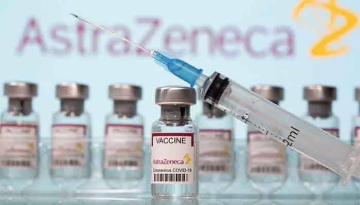 Vials labelled "AstraZeneca Covid-19 Coronavirus Vaccine" and a syringe are seen in front of a displayed AstraZeneca logo in this illustration taken March 10, 2021 ||Photo: REUTERS 