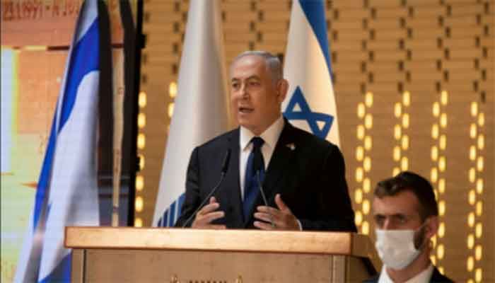 Israeli Prime Minister Benjamin Netanyahu speaks at an official ceremony marking Israel's Memorial Day, which commemorates fallen soldiers and Israeli victims of hostile attacks, at Mount Herzl military cemetery in Jerusalem April 14, 2021. File Photo: REUTERS