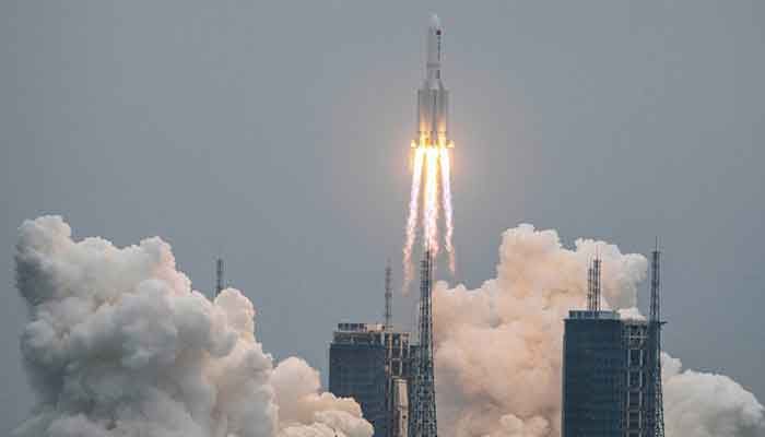 This file photo taken on April 29, 2021 shows a Long March 5B rocket, carrying China’s Tianhe space station core module, lifting off from the Wenchang Space Launch Centre in southern China’s Hainan province. || Photo: AFP