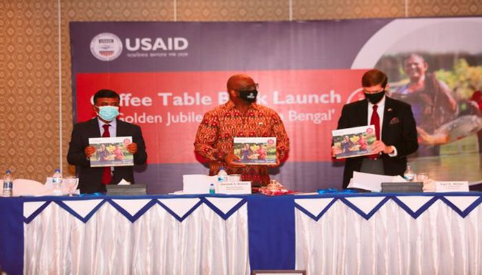 US Ambassador to Bangladesh Earl R. Miller, USAID Mission Director Derrick S. Brown and Economic Relation Division Joint Secretary Kabir Ahmed jointly launched the photography book which illustrates the longstanding partnership between Bangladesh and the US. || Photo: Collected 