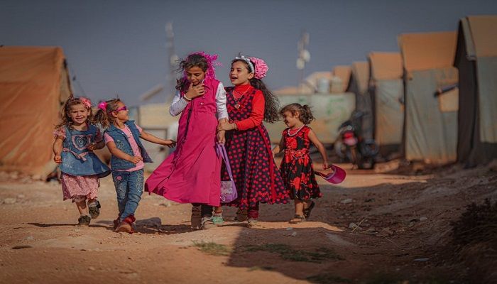 (Idlib, Syria) Children play at a camp during Eid al-Adha. Syrians were forced to leave their homes due to the regime’s attacks.
(Photograph: Muhammed Said/Anadolu Agency/Getty Images)