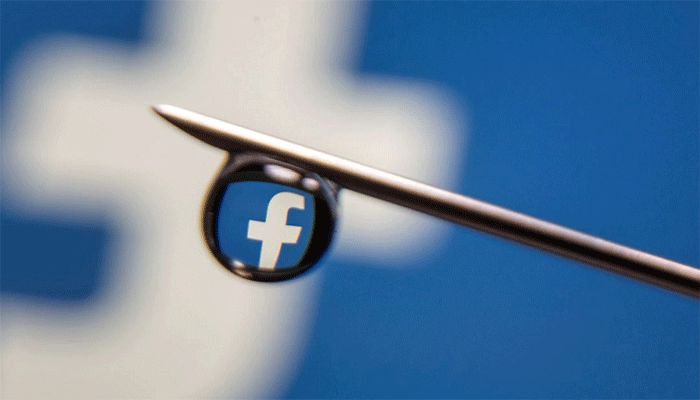 Facebook logo is reflected in a drop on a syringe needle in this illustration photo taken March 16, 2021. || Reuters Photo: Collected  