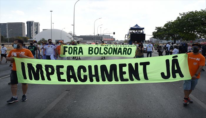 Demonstrators take part in a protest called by right-wing groups and parties to demand the impeachment of Brazilian President Jair Bolsonaro, in Brasilia, Brazil, on September 12 2021. || AFP Photo: Collected  
