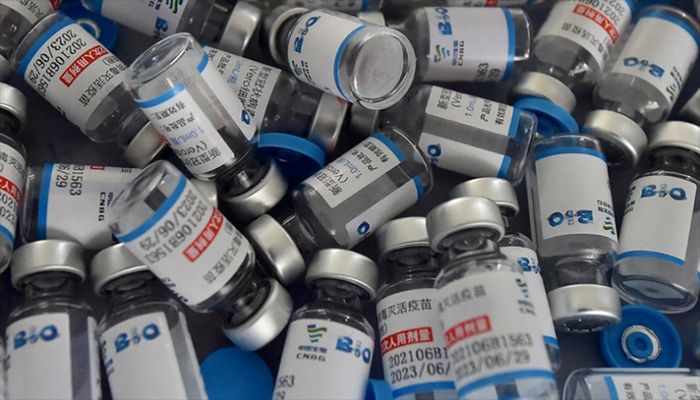 Vials of Sinopharm Covid-19 vaccines are kept at the venue of a mass vaccination camp at Kholamora in Keraniganj on August 7, 2021. || AFP Photo: Collected