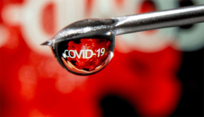 The word "Covid-19" is reflected in a drop on a syringe needle in this illustration taken November 9, 2020. || Reuters Photo: Collected