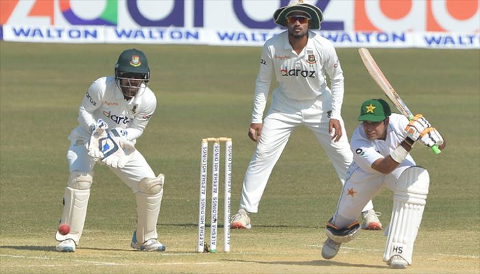 Pakistan's Abid Ali (R) plays a shot during the fifth day of the first Test cricket match between Bangladesh and Pakistan at the Zahur Ahmed Chowdhury Stadium in Chittagong on November 30, 2021. || AFP Photo: Collected 