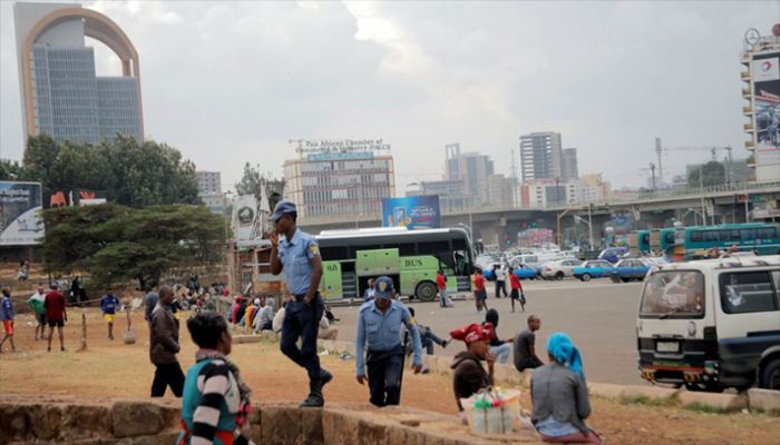 Police officers walk amongst civilians at the Meskel Square in Addis Ababa, Ethiopia February 21, 2018. || Reuters Photo: Collected  