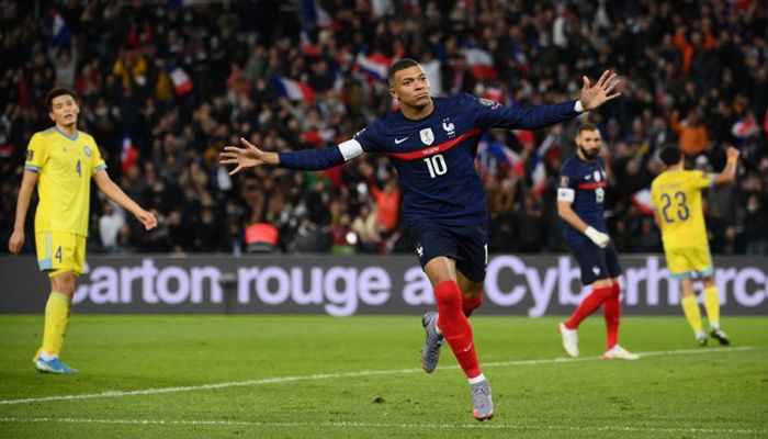France forward Kylian Mbappe celebrates after scoring a goal during their FIFA World Cup 2022 qualification football match against Kazakhstan at the Parc des Princes stadium in Paris on Saturday. || AFP photo: Collected  