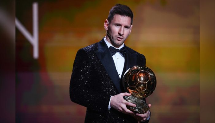 Paris Saint-Germain's Argentine forward Lionel Messi poses after being awarded the Ballon d'Or award during the 2021 Ballon d'Or France Football award ceremony at the Theatre du Chatelet in Paris on November 29, 2021. || AFP Photo: Collected 