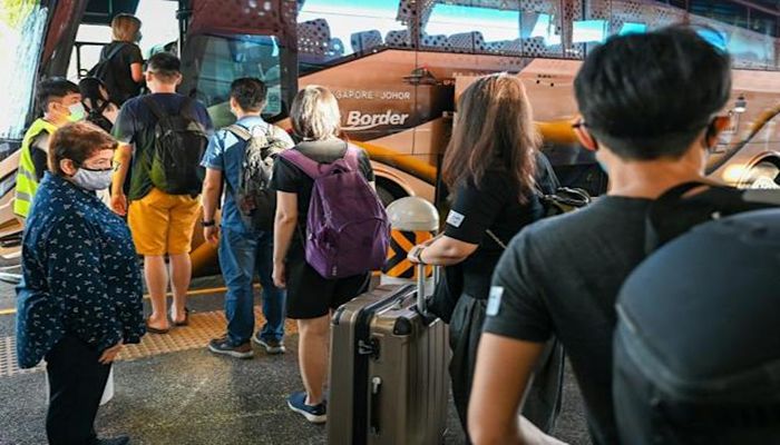Singapore, Malaysia Ease Covid Travel Curbs    