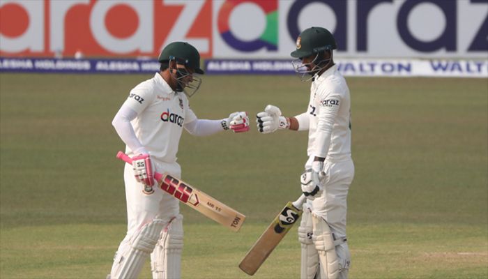 Caption: Bangladesh batsmen Mushfiqur Rahim (L) and Liton bumps their fists during the first day of the first Test between Bangladesh and Pakistan || BCB Photo: Collected 