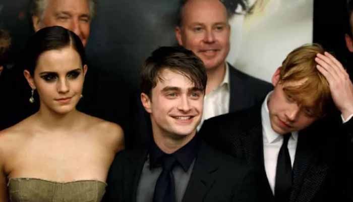 Cast members Rupert Grint (R), Daniel Radcliffe and Emma Watson (L) arrive for the premiere of the film "Harry Potter and the Deathly Hallows: Part 2" in New York July 11, 2011. || Reuters Photo: Collected  