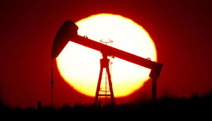 The file photo shows sun sets behind an oil pump outside Saint-Fiacre, near Paris, France on September 17, 2019. || Reuters Photo: Collected  