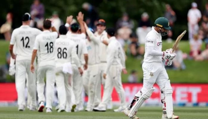 Bangladesh's Nurul Hasan Sohan (R) walks from the field after being caught during day three of the second cricket test match between New Zealand and Bangladesh in Christchurch on January 11, 2022. || AFP Photo: Collected  