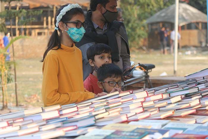 Like other times at Amar Ekushey Book Fair, children in a large number gathered. Children are buying their favorite books at the fair with their parents.