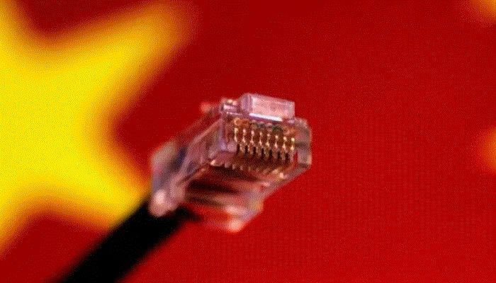 A computer network cable is seen above a Chinese flag in this July 12, 2017 illustration photo || Reuters Photo: Collected  