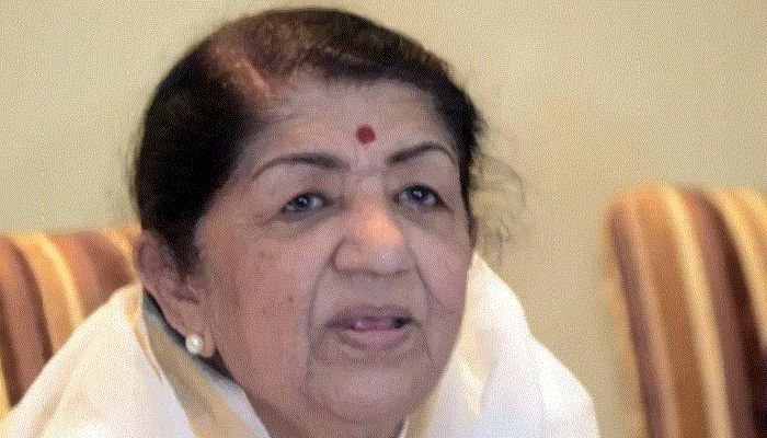In this file photo taken on June 18, 2010 singer Lata Mangeshkar attends the launch of photographer Gautam Rajadhyaksh’s Marathi coffee table book “Chehere” in Mumbai. Beloved Bollywood singer Lata Mangeshkar has died at the age of 92 || AFP Photo 