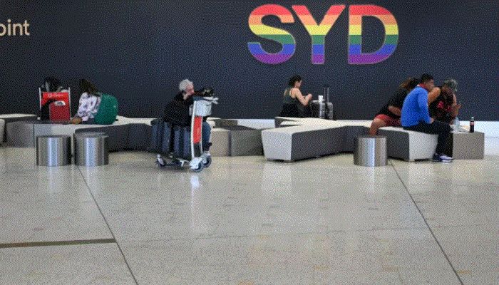File photo shows travellers sit in the international terminal of Kingsford Smith International Airport the morning after Australia implemented an entry ban on non-citizens and non-residents intended to curb the spread of the coronavirus disease (Covid-19) in Sydney, Australia. || Reuters Photo: Collected 