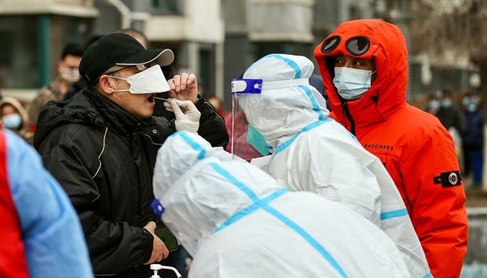 China Locks Down City of 9 Million As Virus Ripples across Country  