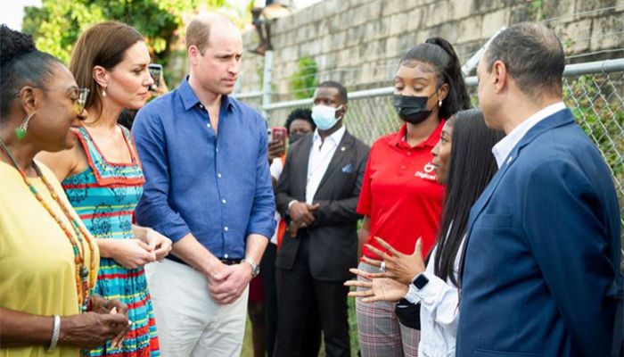 Catherine, Duchess of Cambridge, and Prince William, Duke of Cambridge, chat with Jamaican Olympic Gold medalist Shelly-Ann Fraser-Pryce as they tour the Trench Town community in Kingston, Jamaica, on Tuesday. || Photo: AFP